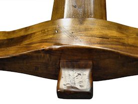 Custom distressed face grain Walnut trestle-style conference table with Wenge accents.  Pop-up electrical grommet access.  Through mortise and tenon jointery.