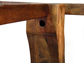 Custom distressed face grain Walnut trestle-style conference table with Wenge accents.  Pop-up electrical grommet access.  Through mortise and tenon jointery.
