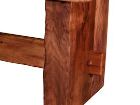 Custom face grain argentinean mesquite dining table.  Rustic trestle-style construction with through mortise and tenon jointery and hand carved edges.