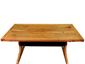 Custom trestle style dining table with self-storing leaves.  Made from spalted pecan with bread board ends and mortise and tenon jointery.