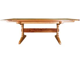 Custom trestle style dining table with self-storing leaves.  Made from spalted pecan with bread board ends and mortise and tenon jointery.