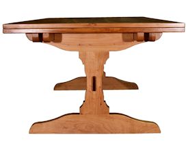 Custom trestle style dining table with self-storing leaves.  Made from spalted pecan with bread board ends and mortise and tenon jointery.