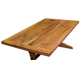 Custom trestle style dining table with self-storing leaves.  Made from spalted pecan with bread board ends and mortise and tenon jointery.