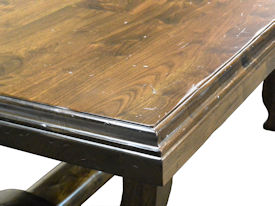 Distressed face grain Walnut trestle-style dining table with mortise and tenon jointery.